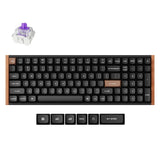 Keychron K4 HE Switch custom wireless keyboard with black keys and wooden detail.