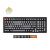 Keychron K4 Max wireless mechanical keyboard with black and orange keys, including switches and keycaps.