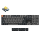 Keychron K5 QMK Version 2 wireless low profile mechanical keyboard with keycaps and a switch.