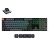 Keychron K5 QMK V2 low profile mechanical keyboard with RGB backlighting and keycaps.