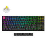 Keychron K8 V2 RGB mechanical keyboard with colorful backlighting and a yellow switch on top.