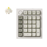 Keychron Q0 Max custom number pad with macro column and rotary knob, featuring ergonomic design and wireless connectivity.